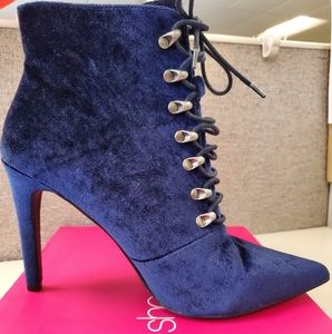 Brand new, never worn booties.